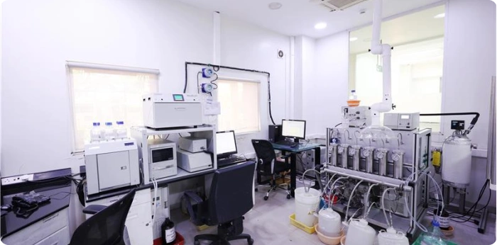Modern laboratory with advanced chromatography instruments used for pharmaceutical research, chemical analysis, and quality control.