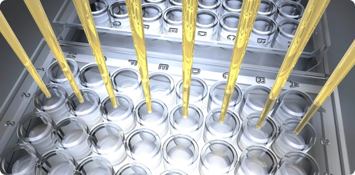 Automated liquid handling system dispensing samples into multi-well plates for in vitro biology