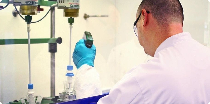 Pharmaceutical scientist conducting laboratory drug testing and analysis