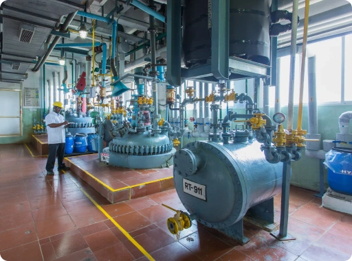 Large-scale cryogenic reactor equipment in pharmaceutical plant for chemical process scale-up and API manufacturing under controlled conditions