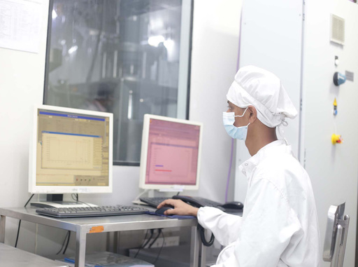 Technician Checking the Result after the Test